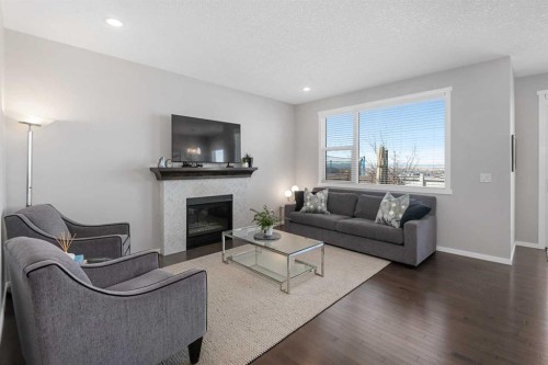 49 Tuscany Ridge Circle Nw, Calgary, AB - Indoor Photo Showing Living Room With Fireplace