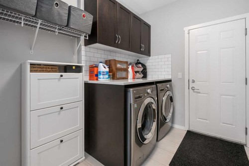 49 Tuscany Ridge Circle Nw, Calgary, AB - Indoor Photo Showing Laundry Room