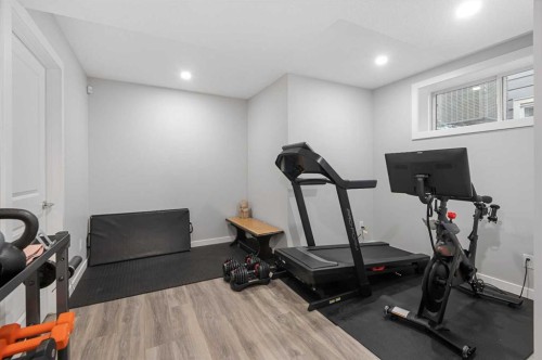 49 Tuscany Ridge Circle Nw, Calgary, AB - Indoor Photo Showing Gym Room