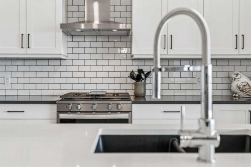 220 Precedence View, Cochrane, AB - Indoor Photo Showing Kitchen With Upgraded Kitchen