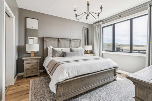 220 Precedence View, Cochrane, AB - Indoor Photo Showing Bedroom