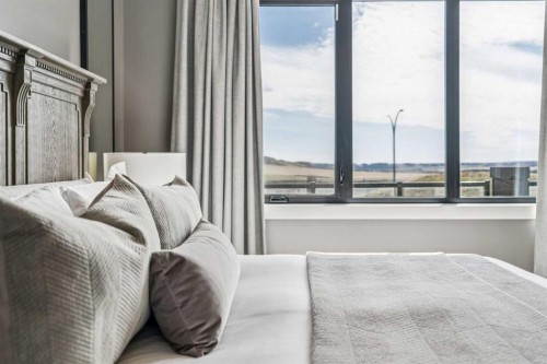 220 Precedence View, Cochrane, AB - Indoor Photo Showing Bedroom