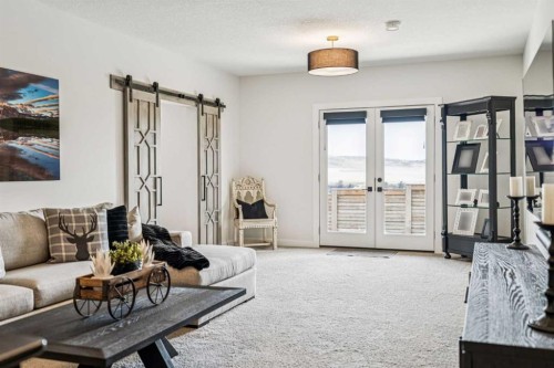 220 Precedence View, Cochrane, AB - Indoor Photo Showing Living Room