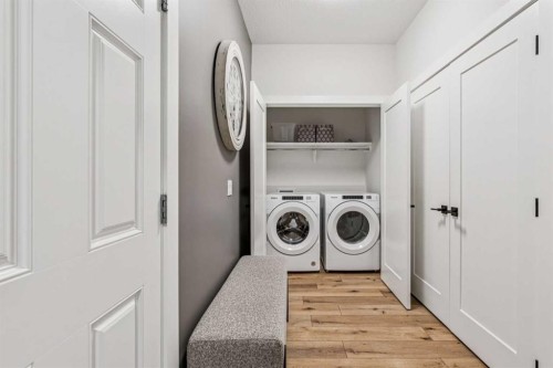 220 Precedence View, Cochrane, AB - Indoor Photo Showing Laundry Room