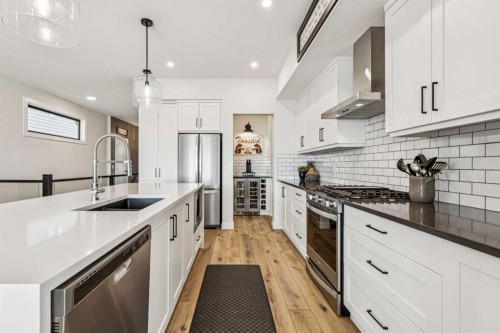 220 Precedence View, Cochrane, AB - Indoor Photo Showing Kitchen With Upgraded Kitchen