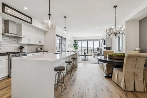 220 Precedence View, Cochrane, AB - Indoor Photo Showing Kitchen With Upgraded Kitchen