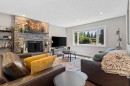 3912 40 Avenue Nw, Calgary, AB  - Indoor Photo Showing Living Room With Fireplace 