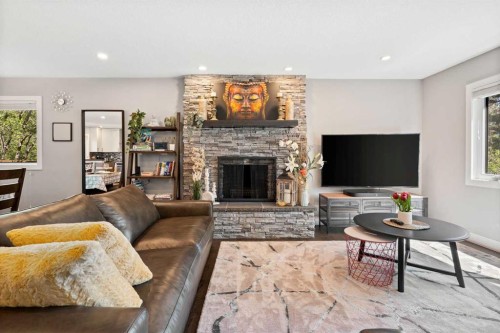 3912 40 Avenue Nw, Calgary, AB - Indoor Photo Showing Living Room With Fireplace