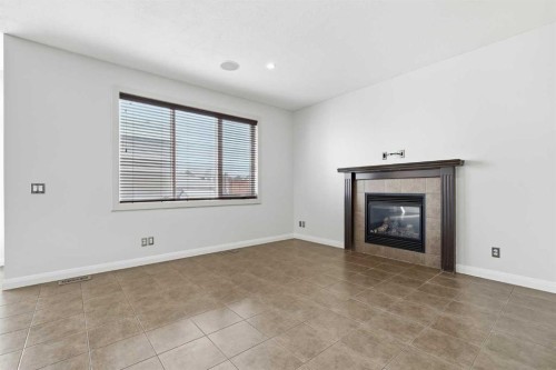 121 Copperstone Close Se, Calgary, AB - Indoor With Fireplace