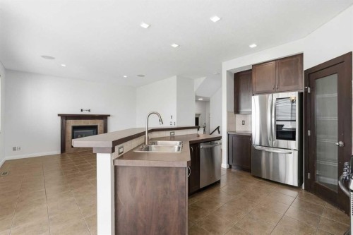 121 Copperstone Close Se, Calgary, AB - Indoor Photo Showing Kitchen With Stainless Steel Kitchen With Double Sink