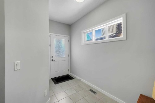 216 Carringvue Manor Nw, Calgary, AB - Indoor Photo Showing Other Room