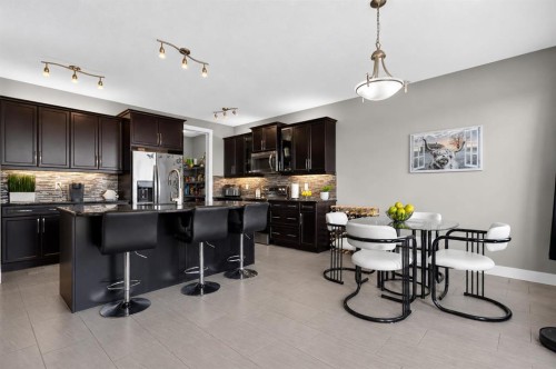 129 Windford Park Sw, Airdrie, AB - Indoor Photo Showing Kitchen With Upgraded Kitchen