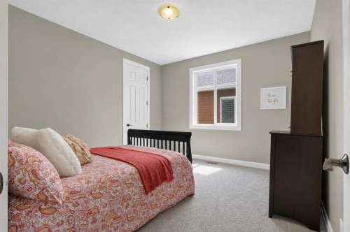129 Windford Park Sw, Airdrie, AB - Indoor Photo Showing Bedroom