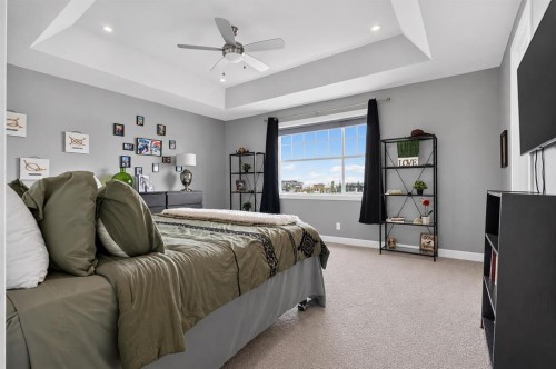 129 Windford Park Sw, Airdrie, AB - Indoor Photo Showing Bedroom
