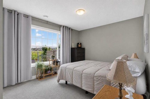 129 Windford Park Sw, Airdrie, AB - Indoor Photo Showing Bedroom