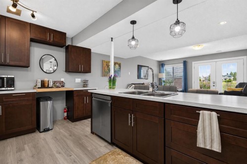 129 Windford Park Sw, Airdrie, AB - Indoor Photo Showing Kitchen With Double Sink