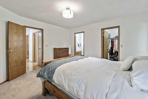 815 3 Street Sw, High River, AB - Indoor Photo Showing Bedroom