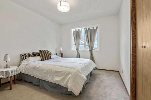 815 3 Street Sw, High River, AB - Indoor Photo Showing Bedroom