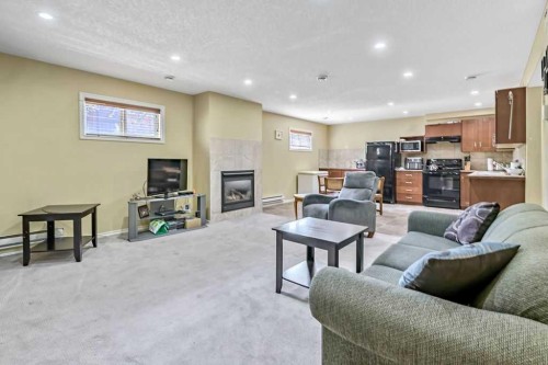 815 3 Street Sw, High River, AB - Indoor With Fireplace