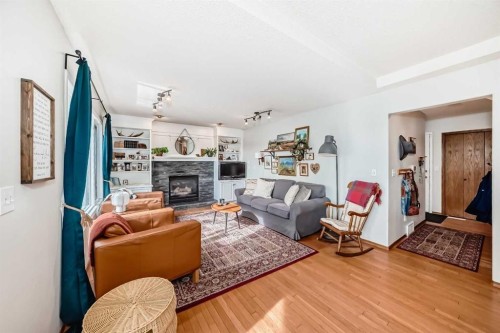 292 Waterstone Crescent Se, Airdrie, AB - Indoor Photo Showing Living Room With Fireplace