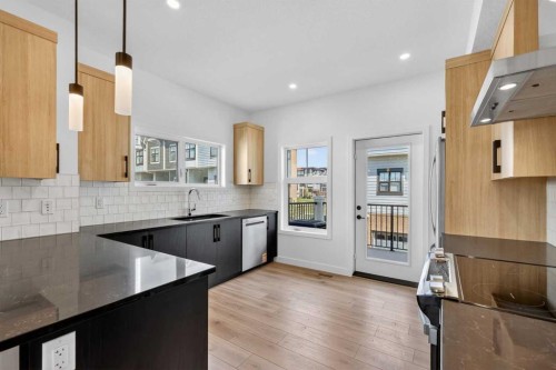 619 Mahogany Road Se, Calgary, AB - Indoor Photo Showing Kitchen With Upgraded Kitchen