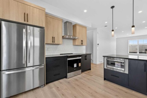 619 Mahogany Road Se, Calgary, AB - Indoor Photo Showing Kitchen With Upgraded Kitchen