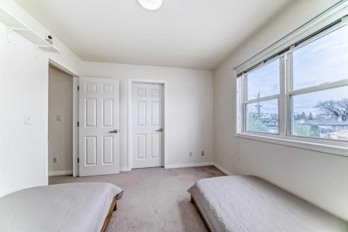 7608 21 Street Se, Calgary, AB - Indoor Photo Showing Bedroom