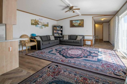 19 Noblefern Way, Sundre, AB - Indoor Photo Showing Living Room