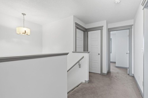 11 Evanscrest Way Nw, Calgary, AB - Indoor Photo Showing Other Room