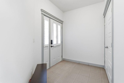 11 Evanscrest Way Nw, Calgary, AB - Indoor Photo Showing Other Room