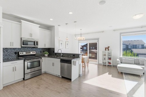 11 Evanscrest Way Nw, Calgary, AB - Indoor Photo Showing Kitchen With Stainless Steel Kitchen With Upgraded Kitchen