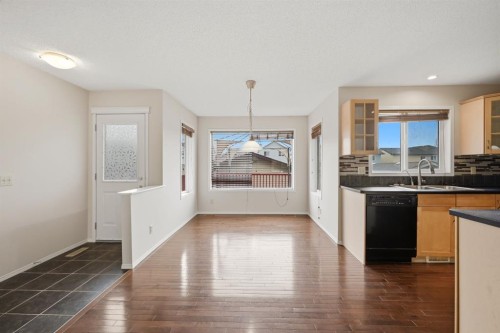 646 Everridge Drive Sw, Calgary, AB - Indoor Photo Showing Kitchen With Double Sink