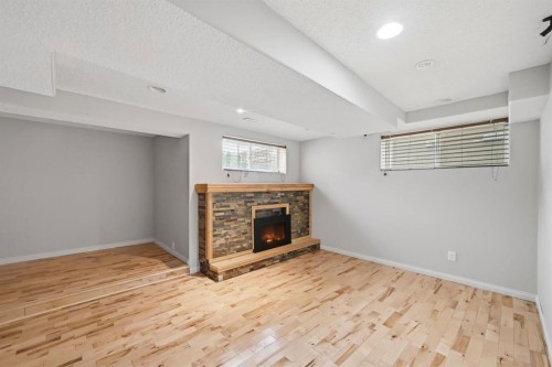 646 Everridge Drive Sw, Calgary, AB - Indoor With Fireplace