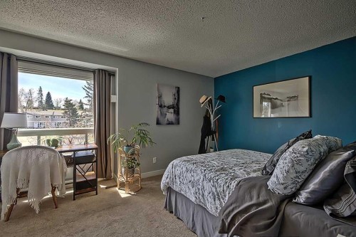 72 Deerpoint Road Se, Calgary, AB - Indoor Photo Showing Bedroom