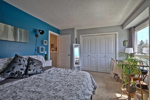 72 Deerpoint Road Se, Calgary, AB - Indoor Photo Showing Bedroom
