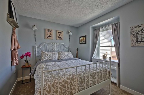 72 Deerpoint Road Se, Calgary, AB - Indoor Photo Showing Bedroom