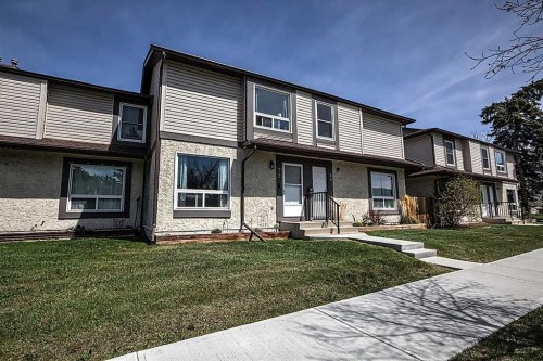 72 Deerpoint Road Se, Calgary, AB - Outdoor With Deck Patio Veranda With Facade