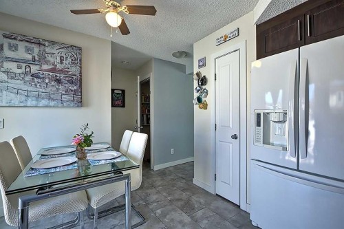 72 Deerpoint Road Se, Calgary, AB - Indoor Photo Showing Dining Room