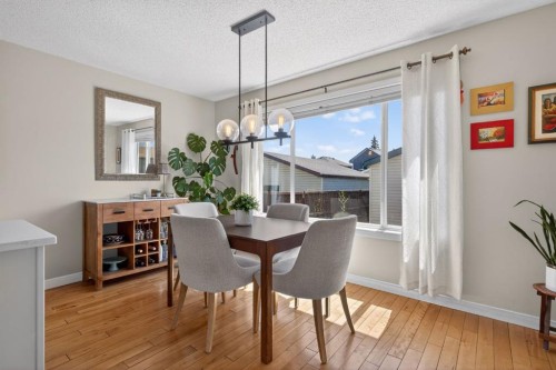 57 Bridlewood Manor Sw, Calgary, AB - Indoor Photo Showing Dining Room