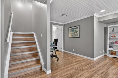 57 Bridlewood Manor Sw, Calgary, AB - Indoor Photo Showing Other Room