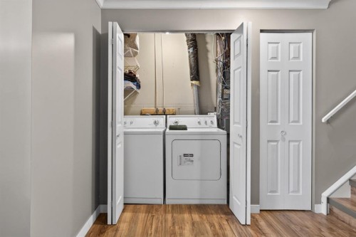 57 Bridlewood Manor Sw, Calgary, AB - Indoor Photo Showing Laundry Room