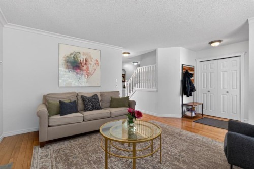 57 Bridlewood Manor Sw, Calgary, AB - Indoor Photo Showing Living Room