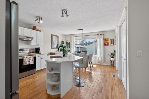 57 Bridlewood Manor Sw, Calgary, AB - Indoor Photo Showing Kitchen