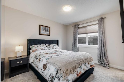 305-2461 Baysprings Link Sw, Airdrie, AB - Indoor Photo Showing Bedroom