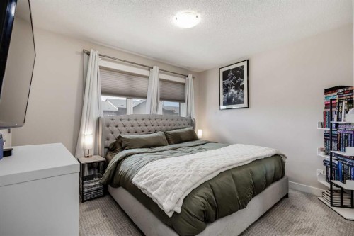 305-2461 Baysprings Link Sw, Airdrie, AB - Indoor Photo Showing Bedroom