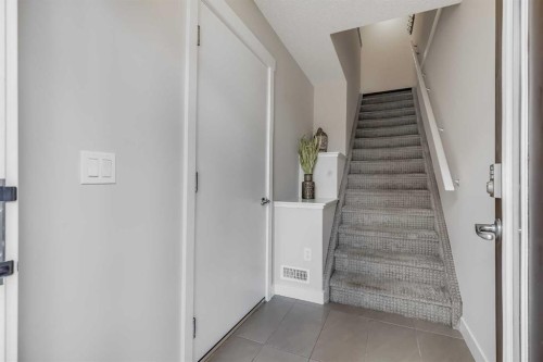 305-2461 Baysprings Link Sw, Airdrie, AB - Indoor Photo Showing Other Room