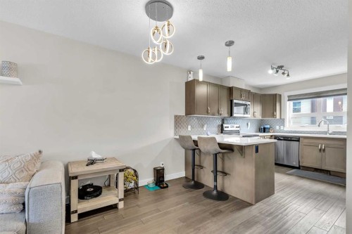 305-2461 Baysprings Link Sw, Airdrie, AB - Indoor Photo Showing Kitchen
