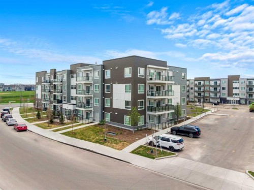 2213-33 Carringham Gate Nw, Calgary, AB - Outdoor With Balcony With Facade