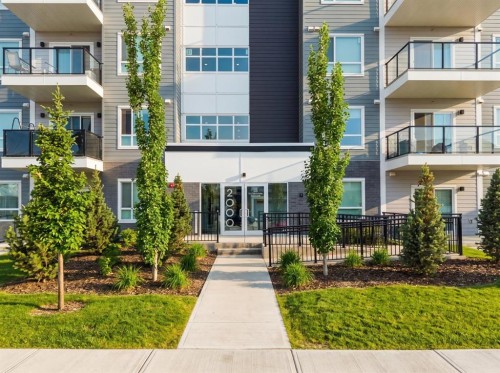 2213-33 Carringham Gate Nw, Calgary, AB - Outdoor With Balcony With Facade