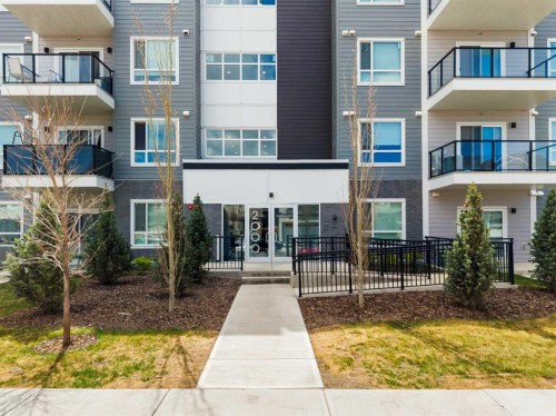 2213-33 Carringham Gate Nw, Calgary, AB - Outdoor With Balcony With Facade